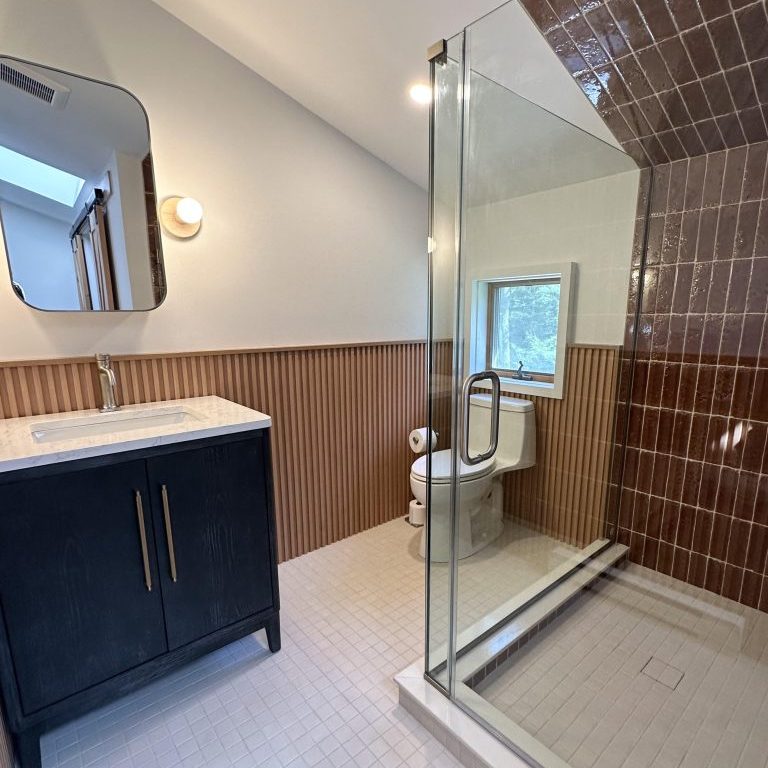 Mid-Century Bathroom Renovation — bathroom in Roscoe, NY by Timber Design + Build